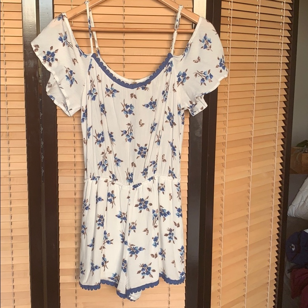 White and blue floral romper with pockets